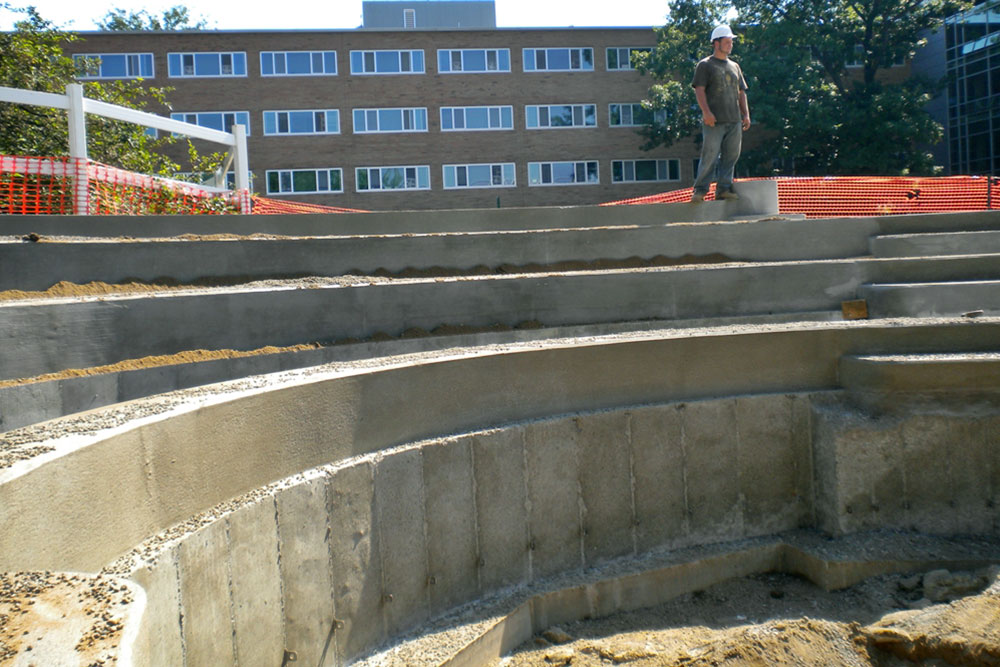 Concrete sidewalks, curbsides, basketbell courts and amphitheatre  and  at MSU Bailey Hall by Moore Trosper Construction